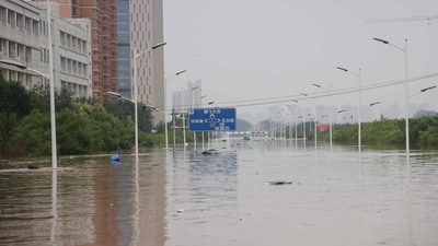 This photo taken on August 2 shows a flooded street after heavy rains in Zhuozhou, in northern China's Hebei province. (AFP) This photo taken on August 2 shows a flooded street after heavy rains in Zhuozhou, in northern China's Hebei province. (AFP)