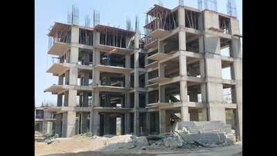 The new report suggests that the authorities must focus on making sure the buyer gets flat possession, and registry is executed and then they can recover their dues later. (HT Photo) The new report suggests that the authorities must focus on making sure the buyer gets flat possession, and registry is executed and then they can recover their dues later. (HT Photo)