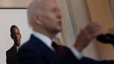 A portrait of former US President Barack Obama is seen as US President Joe Biden speaks during an event in the at the Grand Staircase of the White House to mark the one year anniversary of the Uvalde school mass shooting May 24, 2023, in Washington, DC. A teenage gunman killed 19 children and two teachers at Robb Elementary School in Uvalde, Texas, on May 24, 2022. (Photo by Brendan Smialowski / AFP) (AFP) A portrait of former US President Barack Obama is seen as US President Joe Biden speaks during an event in the at the Grand Staircase of the White House to mark the one year anniversary of the Uvalde school mass shooting May 24, 2023, in Washington, DC. A teenage gunman killed 19 children and two teachers at Robb Elementary School in Uvalde, Texas, on May 24, 2022. (Photo by Brendan Smialowski / AFP) (AFP)