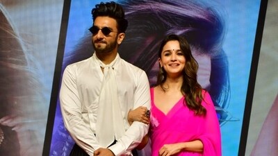 Ranveer Singh and Alia Bhatt pose together for the success meet of Karan Johar's Rocky Aur Rani Kii Prem Kahaani. It opened in theatres on Friday and marked Karan Johar's return to direction seven years after the film, Ae Dil Hai Mushkil. This is also the second film starring Ranveer and Alia together after Zoya Akhtar's Gully Boy in 2019. (Varinder Chawla) Ranveer Singh and Alia Bhatt pose together for the success meet of Karan Johar's Rocky Aur Rani Kii Prem Kahaani. It opened in theatres on Friday and marked Karan Johar's return to direction seven years after the film, Ae Dil Hai Mushkil. This is also the second film starring Ranveer and Alia together after Zoya Akhtar's Gully Boy in 2019. (Varinder Chawla)