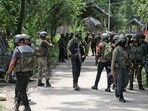 Security personnel conduct a search operation in Kulgam.