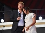 (FILES) Britain's Prince Harry and Meghan Markle speak during the 2021 Global Citizen Live festival at the Great Lawn, Central Park on September 25, 2021 in New York City. A multi-million-dollar deal between a media group run by Britain's Prince Harry and his wife Meghan Markle, and streaming giant Spotify is to end, a report said June 15, 2023. (Photo by Angela Weiss / AFP)