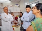 Delhi health minister Saurabh Bharadwaj and Karnataka health minister Dinesh Gundu Rao at a Mohalla Clinic, in New Delhi, Friday.