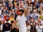 Spain's Carlos Alcaraz celebrates after winning his final match against Serbia's Novak Djokovic