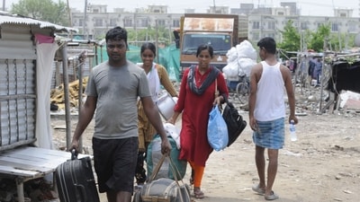 After the communal violence in Nuh on Monday, migrants start leaving the slum near DPS School in Sector-70A, in Gurugram, India, on Thursday, 03 August 2023. (Photo by Parveen Kumar/Hindustan Times) After the communal violence in Nuh on Monday, migrants start leaving the slum near DPS School in Sector-70A, in Gurugram, India, on Thursday, 03 August 2023. (Photo by Parveen Kumar/Hindustan Times)