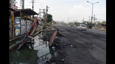 A damaged hand-cart after the violent clash between two groups, in Nuh district, Haryana on Thursday. (ANI)