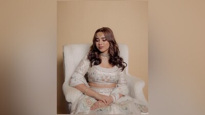 Coming to Aaliyah's traditional look for her engagement celebrations, she chose a mint green lehenga by designer Anita Dongre. The ensemble captures spring and summer vibes perfectly. It features a cropped choli adorned in intricate floral embroidery, sequin embellishments, a wide neckline, quarter-length sleeves, and a fitted silhouette. (Instagram) Coming to Aaliyah's traditional look for her engagement celebrations, she chose a mint green lehenga by designer Anita Dongre. The ensemble captures spring and summer vibes perfectly. It features a cropped choli adorned in intricate floral embroidery, sequin embellishments, a wide neckline, quarter-length sleeves, and a fitted silhouette. (Instagram)