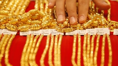 People can buy 10 gram and 100 gram of 22K gold for  ₹54,950 and  ₹54,9500, respectively. (REUTERS)