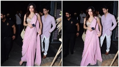 Khushi Kapoor donned a pink sequins saree teamed with a shimmery sleeveless blouse and a matching potli.&nbsp; (HT Photo)
