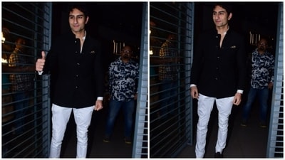 Ibrahim Khan looked regal in his black bandhgala teamed with white pants and brown suede formal shoes.&nbsp; (HT Photo)