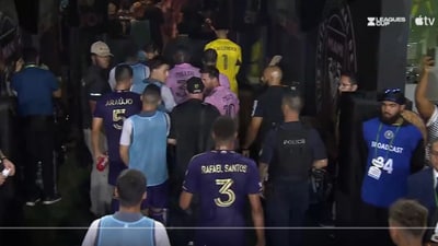 Messi in a heated chat with a Orlando footballer Messi in a heated chat with a Orlando footballer