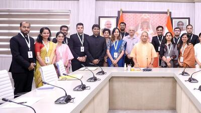 Uttar Pradesh chief minister Yogi Adityanath with young IAS officers in Lucknow on Friday. (HT Photo) Uttar Pradesh chief minister Yogi Adityanath with young IAS officers in Lucknow on Friday. (HT Photo)