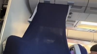 California passenger finds innovative way to convert economy seat into private seat