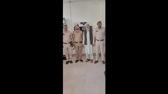 Abdul Karim Butt in custody of Jammu and Kashmir Police. (HT Photo)