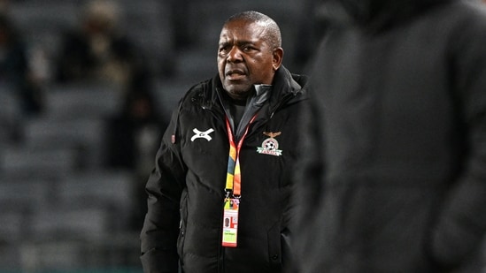 Zambia's coach Bruce Mwape looks on during the Australia and New Zealand 2023 Women's World Cup Group C football match between Spain and Zambia (AFP)