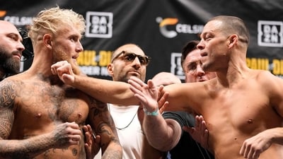 DALLAS, TEXAS - AUGUST 04: Nate Diaz lunges at Jake Paul during weigh-ins for their fight at American Airlines Center on August 04, 2023 in Dallas, Texas. Sam Hodde/Getty Images/AFP (Photo by Sam Hodde / GETTY IMAGES NORTH AMERICA / Getty Images via AFP) (Getty Images via AFP) DALLAS, TEXAS - AUGUST 04: Nate Diaz lunges at Jake Paul during weigh-ins for their fight at American Airlines Center on August 04, 2023 in Dallas, Texas. Sam Hodde/Getty Images/AFP (Photo by Sam Hodde / GETTY IMAGES NORTH AMERICA / Getty Images via AFP) (Getty Images via AFP)