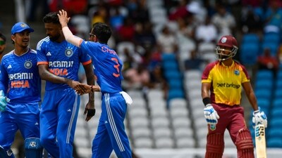 Ishan Kishan (L), Hardik Pandya (2L) and Yuzvendra Chahal (3L) of India celebrate during the first T20I against West Indies (AFP) Ishan Kishan (L), Hardik Pandya (2L) and Yuzvendra Chahal (3L) of India celebrate during the first T20I against West Indies (AFP)