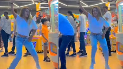 The image shows a woman dancing in a gaming arcade. (Instagram/@_sahelirudra_) The image shows a woman dancing in a gaming arcade. (Instagram/@_sahelirudra_)