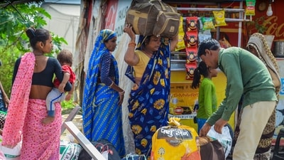 Residents prepare to shift from Sector-71 area following incidents of violence, in Gurugram, Friday, August 4. (PTI) Residents prepare to shift from Sector-71 area following incidents of violence, in Gurugram, Friday, August 4. (PTI)