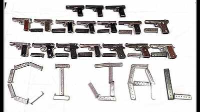 Police seized 17 pistols of .32 bore along with 35 magazine. Police seized 17 pistols of .32 bore along with 35 magazine.