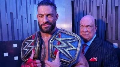 Roman Reigns and Paul Heyman (File) Roman Reigns and Paul Heyman (File)