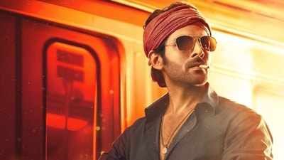 Kartik Aaryan in a still from Rohit Dhawan's Shehzada. Kartik Aaryan in a still from Rohit Dhawan's Shehzada.