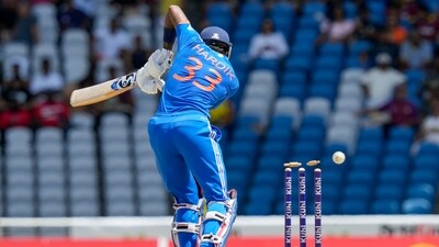 India's captain Hardik Pandya is bowled by West Indies' Jason Holder during their first T20 cricket match at the Brian Lara Stadium in Tarouba, Trinidad and Tobago (AP) India's captain Hardik Pandya is bowled by West Indies' Jason Holder during their first T20 cricket match at the Brian Lara Stadium in Tarouba, Trinidad and Tobago (AP)
