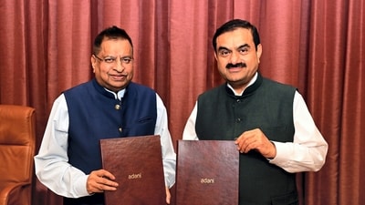 Adani Group Chairman Gautam Adani with Sanghi Industries Chairman & Managing Director Ravi Sanghi. (PTI) Adani Group Chairman Gautam Adani with Sanghi Industries Chairman & Managing Director Ravi Sanghi. (PTI)