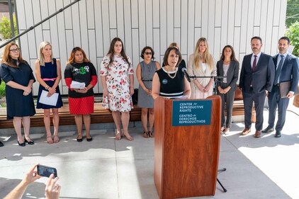 (FILES) Center for Reproductive Rights attorneys Molly Duane (C) speaks during a press conference outside the Travis County Courthouse on July 19, 2023 in Austin, Texas. A court in Texas on August 4, issued a temporary order siding with a group of women and doctors who brought a lawsuit challenging the state's abortion bans. 
The case, which was filed by the Center for Reproductive Rights, argues that the way medical exceptions are defined in Texas' laws is confusing, stoking fear among doctors and causing a "health crisis." (Photo by SUZANNE CORDEIRO / AFP) (AFP)