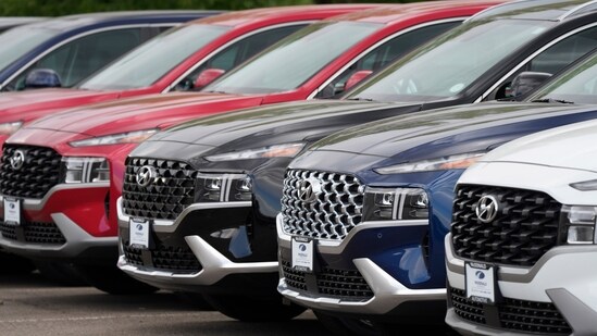 A line of 2022 Santa Fe SUVs sits outside a Hyundai dealership. (Representative Image/AP)