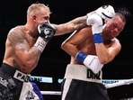Aug 5, 2023; Dallas, Texas, USA;  Jake Paul (left) fights against Nate Diaz in a boxing match at American Airlines Center. Mandatory Credit: Kevin Jairaj-USA TODAY Sports