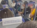 A passenger seen fanning himself inside the IndiGo flight. A passenger seen fanning himself inside the IndiGo flight.