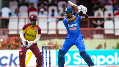 Hardik Pandya hits four as Nicholas Pooran looks on during the 2nd T20I between West Indies and India (AFP) Hardik Pandya hits four as Nicholas Pooran looks on during the 2nd T20I between West Indies and India (AFP)