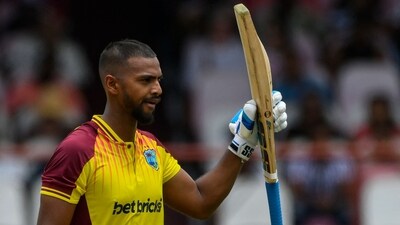 Nicholas Pooran celebrates his half century during the 2nd T20I between West Indies and India at Guyana National Stadium in Providence, Guyana (AFP) Nicholas Pooran celebrates his half century during the 2nd T20I between West Indies and India at Guyana National Stadium in Providence, Guyana (AFP)