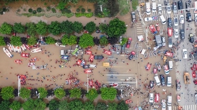 China Floods: Rescue workers deploy life rafts for evacuating residents during floods in Zhuozhou in northern China's Hebei province. (AP) China Floods: Rescue workers deploy life rafts for evacuating residents during floods in Zhuozhou in northern China's Hebei province. (AP)