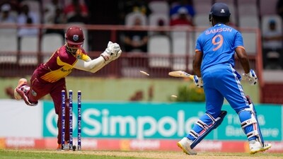Sanju Samson is stumped by Nicholas Pooran during the second T20 match at Providence Stadium in Georgetown, Guyana (AP) Sanju Samson is stumped by Nicholas Pooran during the second T20 match at Providence Stadium in Georgetown, Guyana (AP)