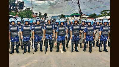 Security personnel stand guard at Kwakta in Bishnupur district on August 3. (PTI) Security personnel stand guard at Kwakta in Bishnupur district on August 3. (PTI)