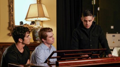 Taylor Zakhar Perez and Nicholas Galitzine with director Matthew López on the set of Red, White and Royal Blue.