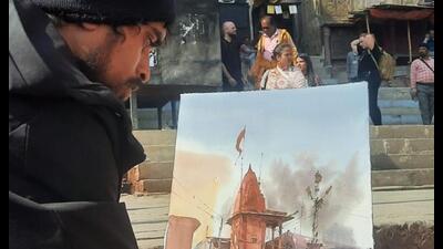 Praveen Patel at work on Varanasi ghat (sourced) Praveen Patel at work on Varanasi ghat (sourced)
