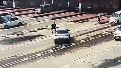 Screengrab of CCTV footage shows the white Brezza SUV mowing down the toll plaza employee on Monday. (HT Photo) Screengrab of CCTV footage shows the white Brezza SUV mowing down the toll plaza employee on Monday. (HT Photo)