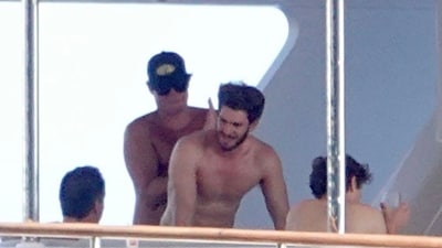 Andrew Garfield chilling shirtless with friends in Italy