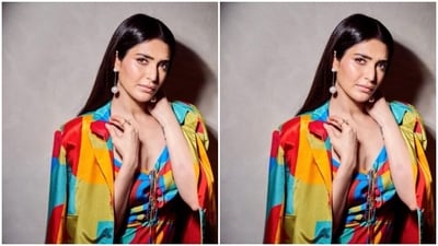 Karishma picked a multicoloured cropped top and teamed it with matching trousers and an oversized blazer. (Instagram/@karishmaktanna) Karishma picked a multicoloured cropped top and teamed it with matching trousers and an oversized blazer. (Instagram/@karishmaktanna)
