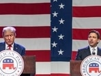 Former President Donald Trump and Florida Governor and 2024 Republican Presidential hopeful Ron DeSantis speak at the Republican Party of Iowa's 2023 Lincoln Dinner at the Iowa Events Center in Des Moines,(AFP) Former President Donald Trump and Florida Governor and 2024 Republican Presidential hopeful Ron DeSantis speak at the Republican Party of Iowa's 2023 Lincoln Dinner at the Iowa Events Center in Des Moines,(AFP)