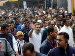 Congress leader Rahul Gandhi waves to the supporters as he leads the party's Bharat Jodo Yatra in Delhi.