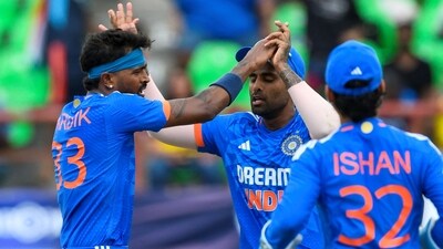 Hardik Pandya (L), Suryakumar Yadav (C) and Ishan Kisna (R) of India celebrate (AFP) Hardik Pandya (L), Suryakumar Yadav (C) and Ishan Kisna (R) of India celebrate (AFP)