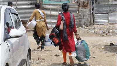 Following a mahapanchayat called in Sector 57’s Tigra village, wherein calls were made for an economic and social boycott of Muslims, several migrant workers started leaving Gurugram. (Parveen Kumar/HT Photo) Following a mahapanchayat called in Sector 57’s Tigra village, wherein calls were made for an economic and social boycott of Muslims, several migrant workers started leaving Gurugram. (Parveen Kumar/HT Photo)