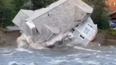 A mansion was seen in a video collapsing into a river in Alaska and being swept away by water (@WeatherNation screenshot/X) A mansion was seen in a video collapsing into a river in Alaska and being swept away by water (@WeatherNation screenshot/X)