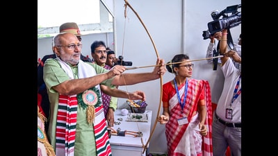 Jharkhand governor CP Radhakrishnan tries his hand at archery during a programme on the eve of Adivasi Diwas -2023, at Ranchi University on Tuesday. (ANI) Jharkhand governor CP Radhakrishnan tries his hand at archery during a programme on the eve of Adivasi Diwas -2023, at Ranchi University on Tuesday. (ANI)