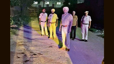 Police investigating a the spot after murder of a factory worker at Focal Point in Ludhiana. (HT PHOTO)