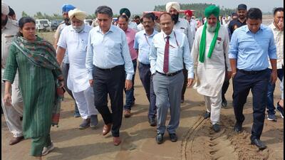 The inter-ministerial central team taking a tour of areas along the Ghaggar in Mohali on Tuesday. (HT Photo) The inter-ministerial central team taking a tour of areas along the Ghaggar in Mohali on Tuesday. (HT Photo)